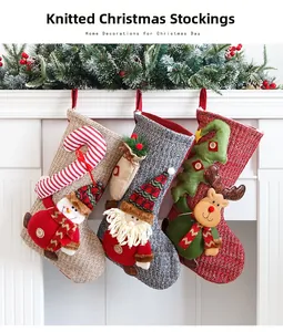 Three knit Christmas stockings with 3D Santa, Snowman, and Reindeer hung on a mantel