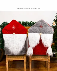 Christmas gnome chair covers with faux fur beards and star embroidery for festive dining decor