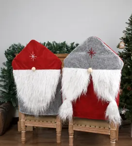 Detail of red and grey gnome chair covers with white faux fur and star embroidery