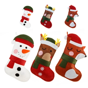 Three-piece felt Christmas stockings set featuring snowman, reindeer, and fox designs