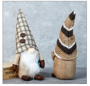 Detail of coffee gnome decor showing plaid hats and realistic long white fiber beards
