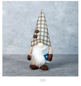 Close-up of coffee gnome doll with burlap hat, plush beard, and a tiny blue heart cup