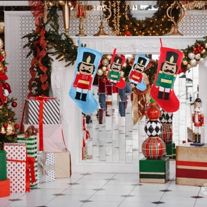 Set di quattro calze di Natale con motivi ricamati di soldato schiaccianoci