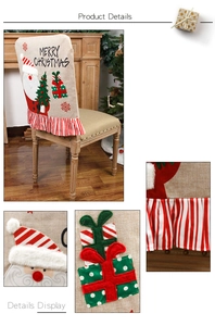 Detail of Christmas chair cover with Santa embroidery and festive striped ruffle trim
