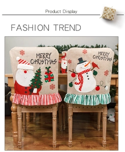 Detail of burlap Christmas chair covers featuring Santa and Snowman embroidery decor