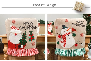 Detail of Christmas chair covers with embroidered Santa and snowman on beige linen fabric