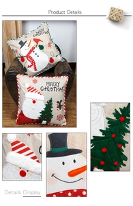 Detail of Christmas pillowcase showing linen embroidery texture and 3D plush Santa design