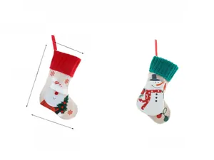 Detailed view of burlap Christmas stockings with Santa and snowman embroidery for gifts