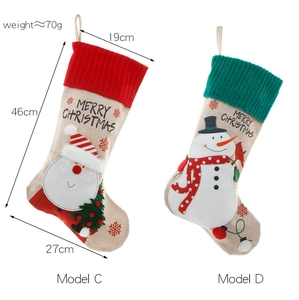 Detail of Christmas stockings with dimensions 46x27cm featuring Santa and Snowman embroidery