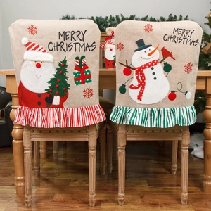 Christmas burlap chair covers featuring embroidered Santa and Snowman with striped ruffles