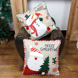 Set of 2 Christmas linen throw pillow covers featuring Santa Claus and snowman embroidery