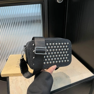 Retro black square crossbody camera bag with silver studs and wide nylon shoulder strap