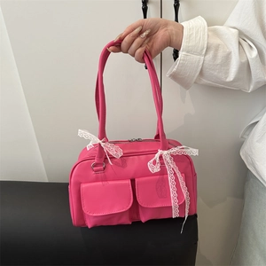 Fuchsia PU leather shoulder bag with vintage pockets and white lace bow decoration