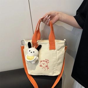 Japanese style canvas tote bag with orange straps and a cute cartoon bear print