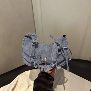 Blue and white pleated shoulder bag with metallic butterfly buckle for women