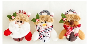 Detailed view of plush Santa, Snowman and Reindeer ornaments with colored 6cm bells