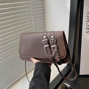 Dark brown matte PU leather baguette bag with silver buckles and chain details