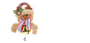 Detail von Plüsch-Rentier-Weihnachtsschmuck mit Schneeflockenschal und goldener Glocke