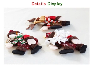Detail display of Santa, Snowman and Reindeer plush ornaments with knitted scarves