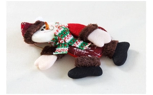 Detailed view of plush Christmas snowman ornament with knitted hat and festive scarf decor