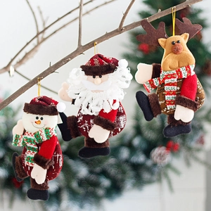 Plush Christmas hanging ornaments featuring Santa, Snowman and Reindeer on branches