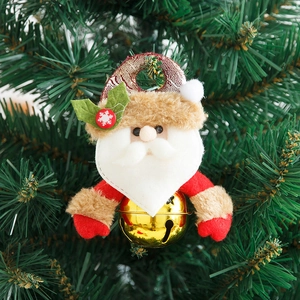 Weihnachtsmann Plüschfigur mit großer glänzender Goldglocke am Weihnachtsbaum