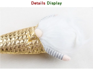 Détail du bonnet en tissu gaufré doré et de la barbe en peluche blanche d'un nain de Noël