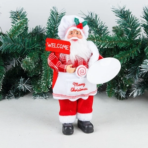 Standing Santa Claus chef figurine with Welcome sign and Merry Christmas apron decor