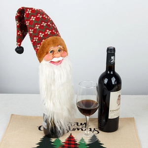Christmas Santa wine bottle cover with knit hat and beard for festive table decoration
