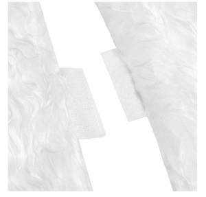 Macro view of white faux fur Christmas tree skirt showing velcro closure detail