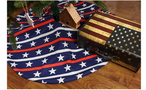 Detail of American flag Christmas tree skirt with stars and stripes on wood floor