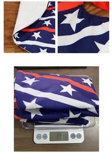 Detail of USA flag pattern fabric with stars and stripes showing 171.8g weight on a scale