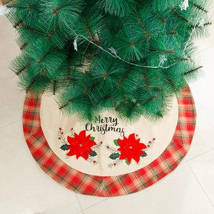 Classic Christmas tree skirt with Merry Christmas script and red-green plaid border
