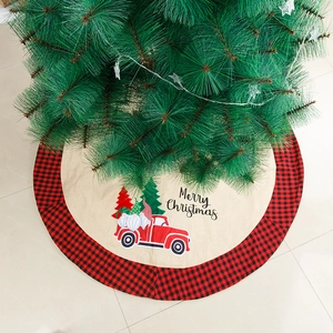 Linen Christmas tree skirt with red buffalo plaid border and gnome truck graphics