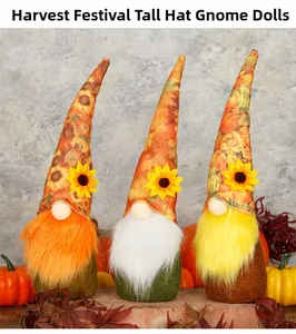 Three plush harvest festival gnomes with long hats, sunflowers and pumpkin patterns
