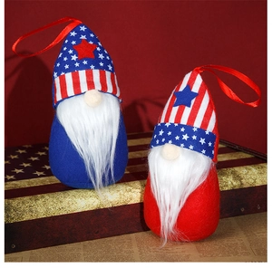 Close-up of Independence Day gnome ornaments with star and stripe hat and faux fur beard