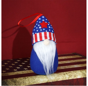 Close-up of patriotic gnome ornament with stars and stripes hat and soft white beard