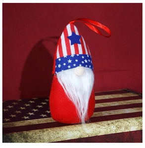 Detail of Patriotic gnome ornament with American flag stripes and stars on red background