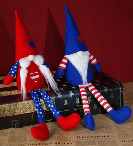 Detail of USA Independence Day gnomes with stars and stripes on vintage suitcase