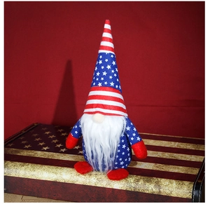 Detail of a Fourth of July gnome with patriotic stars and stripes on a vintage prop