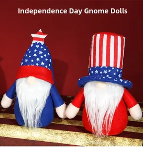 Close-up of Independence Day gnomes with American flag patterns on a red background