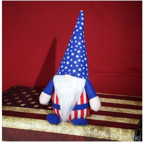 Detailed close-up of Independence Day gnome ornament with stars and stripes patterns