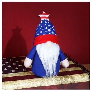 Detail of Fourth of July gnome doll on American flag suitcase for festive decor