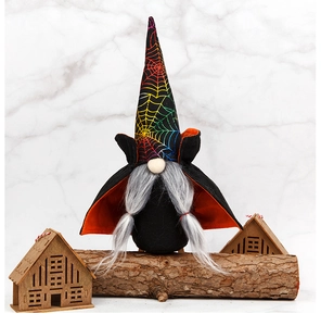 Halloween faceless witch gnome with spider web hat and black cloak on a wooden display