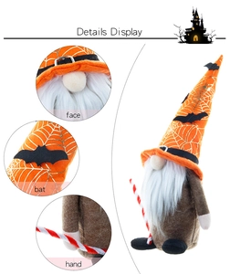Detail display of Halloween gnome showing face, bat decoration, and hand craftsmanship