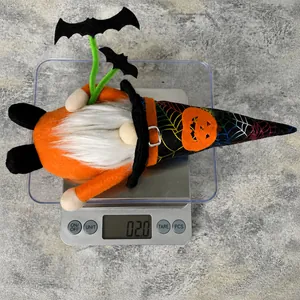 Weight measurement of a plush Halloween gnome doll with spider web hat and bat prop