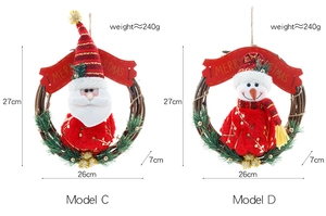 Close-up of Merry Christmas rattan wreaths with Santa and Snowman plush, 27cm x 26cm size