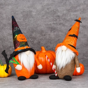 Halloween plush gnome set with spider web hats and pumpkin decor on stone background
