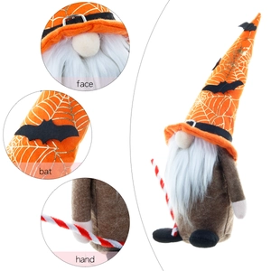 Halloween gnome plush with orange spider web hat and black bat decor on white background