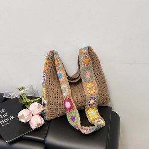 Brown crochet shoulder bag with colorful floral straps and bohemian knit pattern for summer